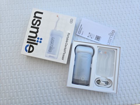 Caja y contenido del irrigador usmile C10