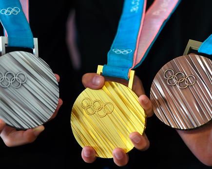 medallistas olimpicos plata bronce feliz