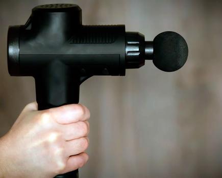 como utilizar una pistola de masaje