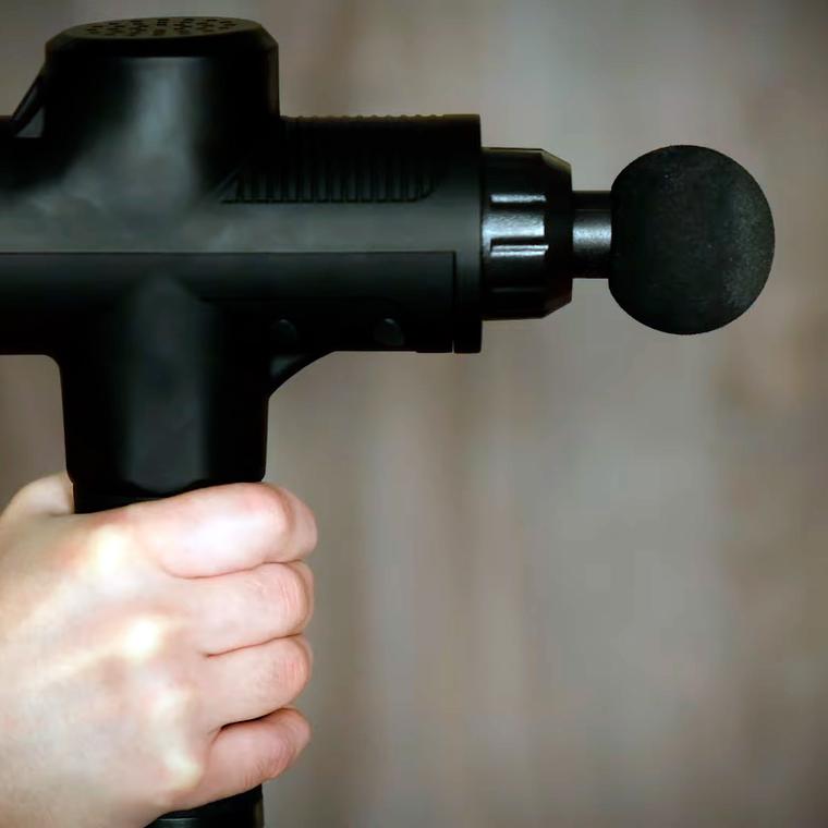 como utilizar una pistola de masaje