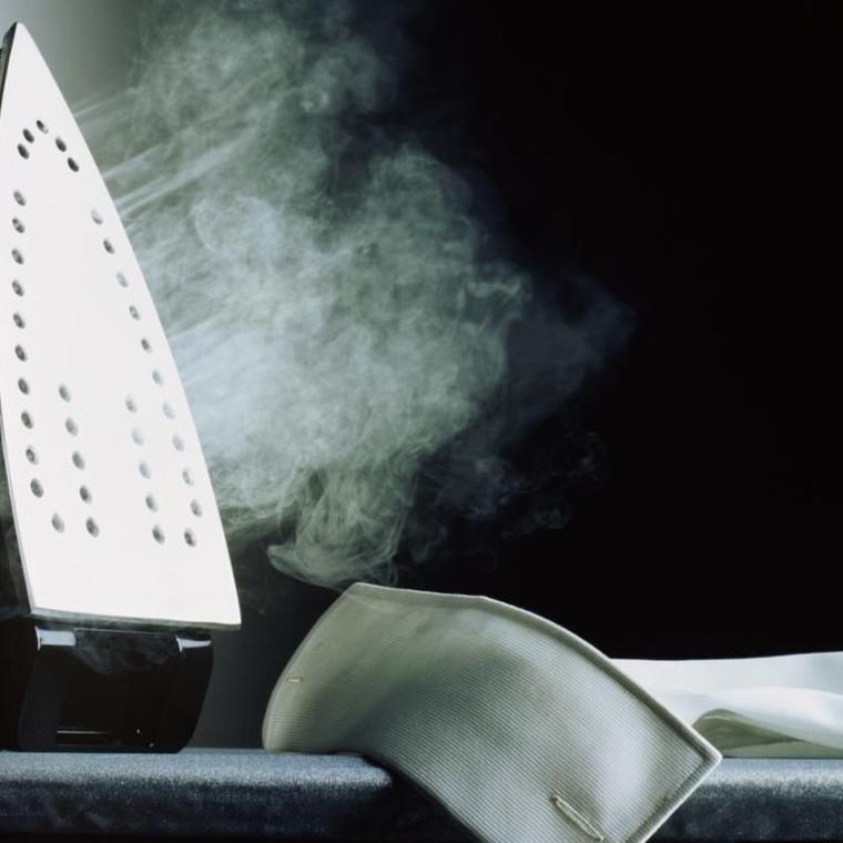 como limpiar la plancha de vapor
