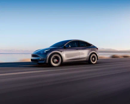 tesla 320 mil vehiculos