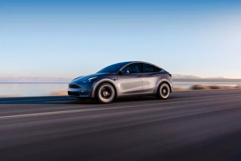 tesla 320 mil vehiculos