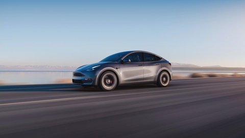 tesla 320 mil vehiculos