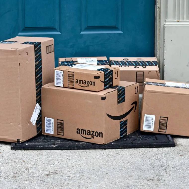 como descargar todo historial pedidos de amazon